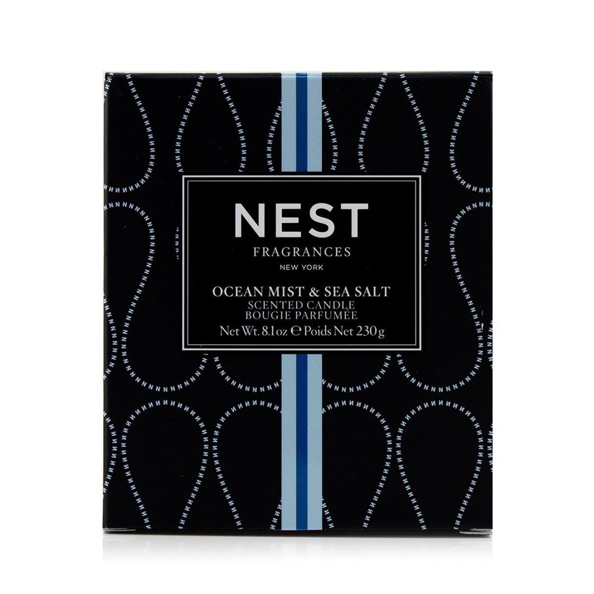 Scented candle in a decorative vessel, featuring Ocean Mist & Sea Salt scent, ideal for creating a calming ambience.