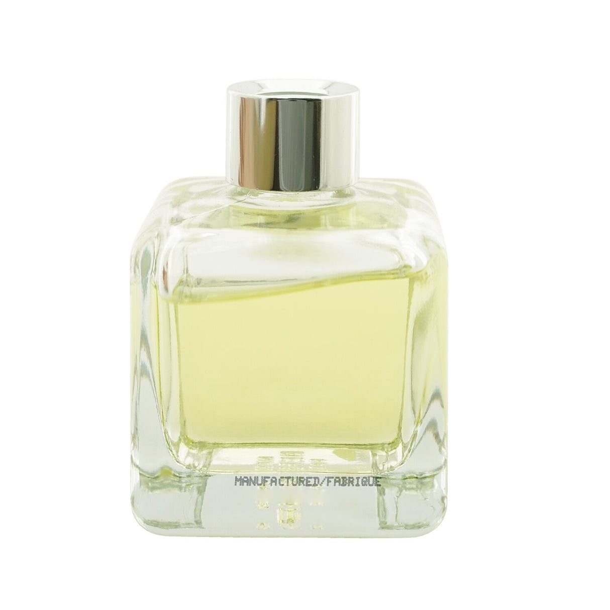 Elegant glass cube diffuser with Orange Cinnamon fragrance, featuring engineered polymer sticks for optimal scent diffusion.