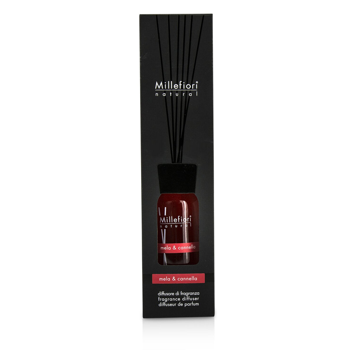 Millefiori Natural Fragrance Diffuser in stylish glass bottle, infusing apple and cinnamon scents for a warm home ambiance.