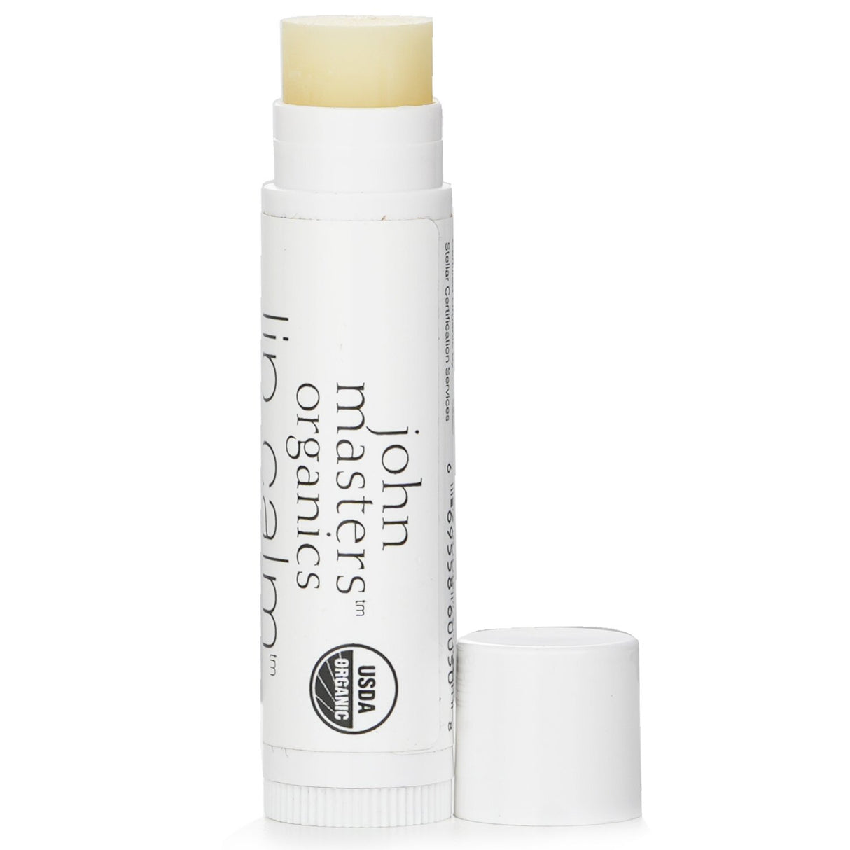 John Masters Organics Lip Calm in Peppermint, a 4g organic lip balm that nourishes and protects lips from dryness.