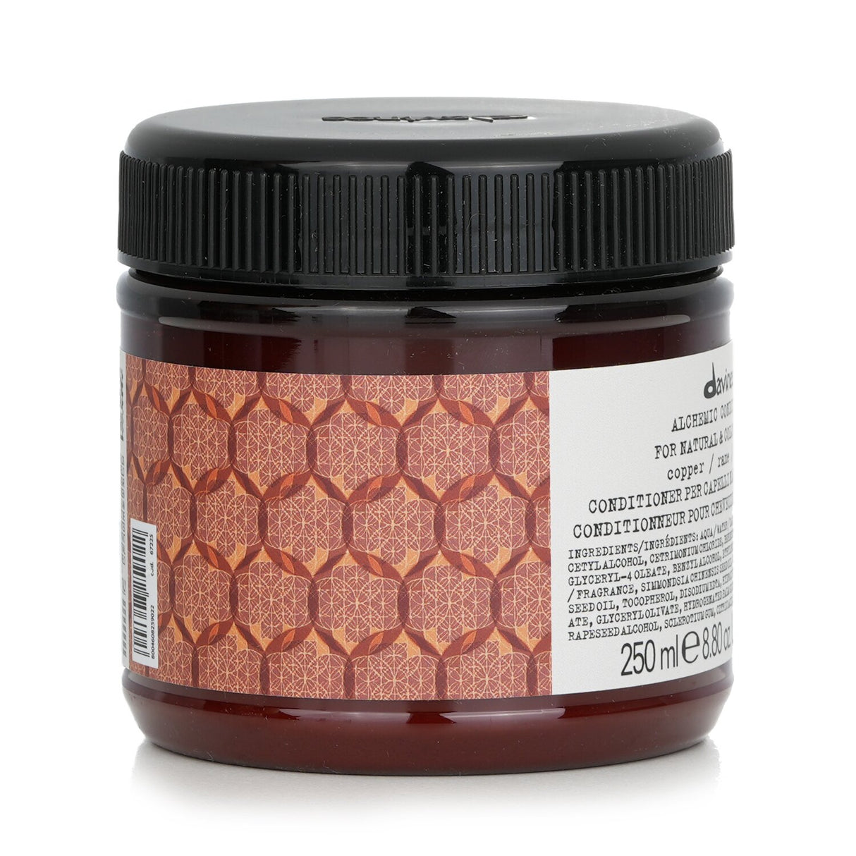 Davines Alchemic Conditioner in Copper enhances and conditions colored hair for vibrant shine and softness in a 250ml bottle.