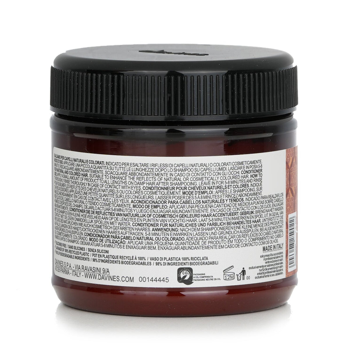 Copper-tinted conditioner for enhancing and smoothing natural or colored hair, enriched with milk proteins for shine.