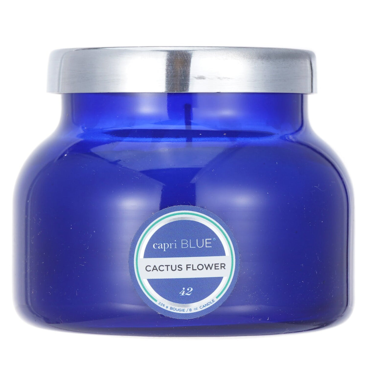 Capri Blue blue jar candle in Cactus Flower scent, featuring peony and peach fragrances, elegant design, burns for 25 hours.