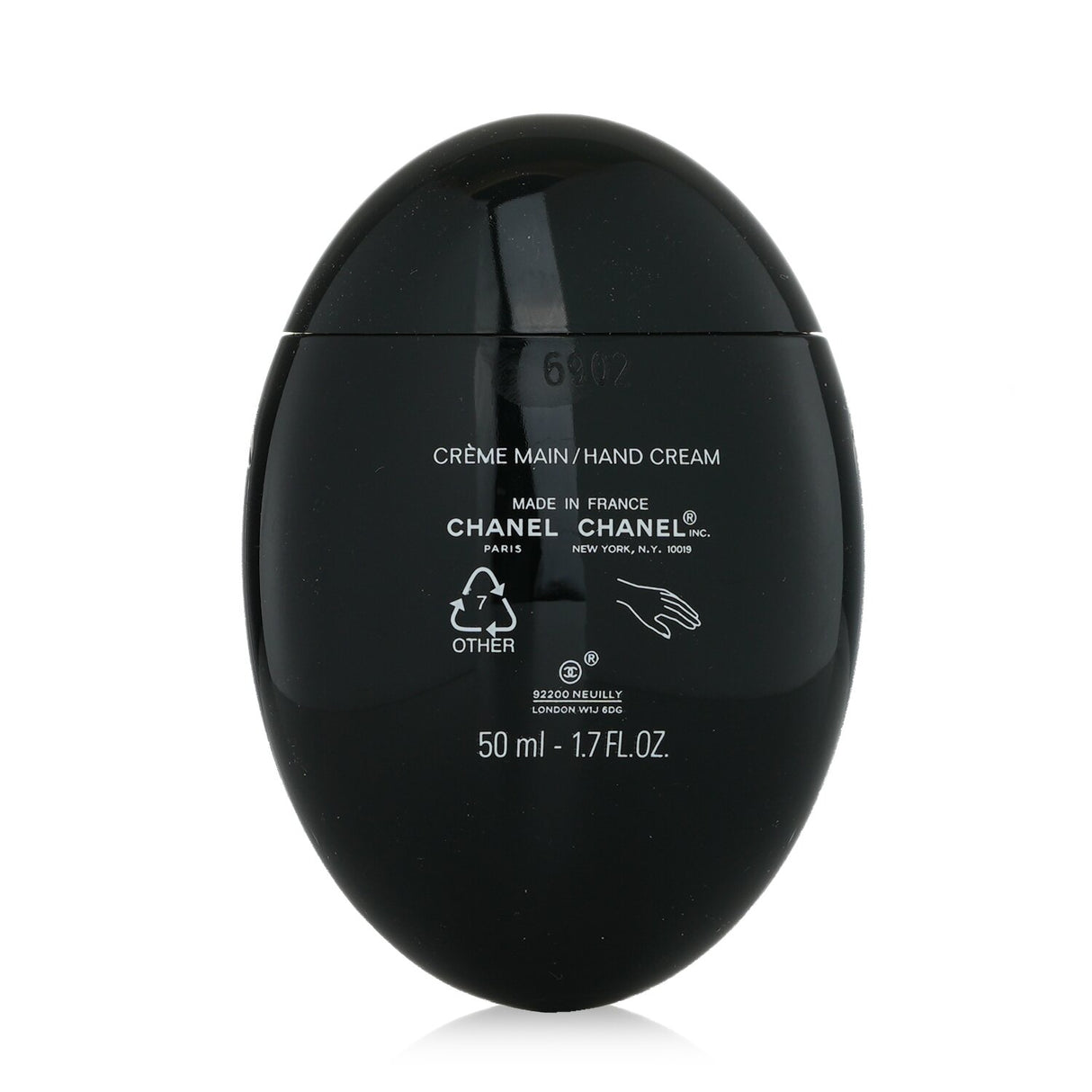 Chanel Le Lift Hand Cream in sleek pebble-shaped container, 50ml, promotes hydration, firming, and brightening for beautiful hands.