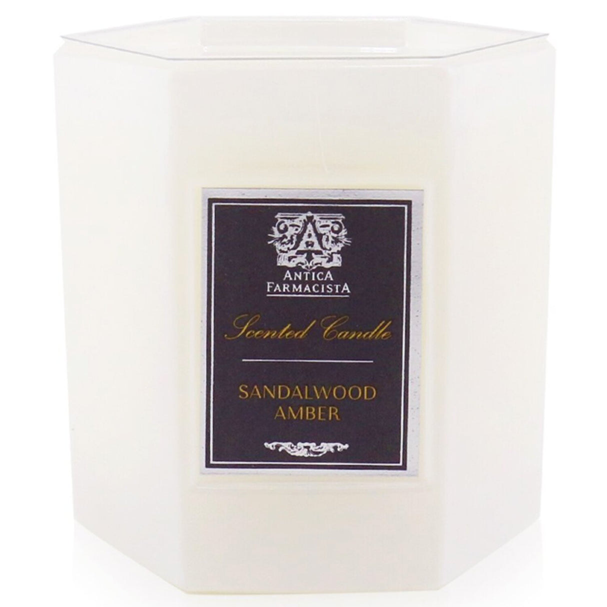 Luxurious Sandalwood Amber candle in soft white glass, offering 60 hours of rich, complex fragrance for a warm atmosphere.