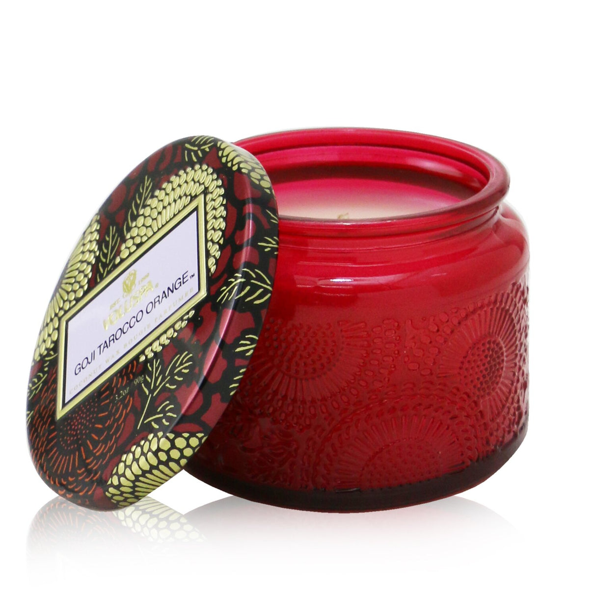 Petite jar candle in vibrant goji and Tarocco orange scent, featuring an ornate Japanese-inspired design and eco-friendly wax.