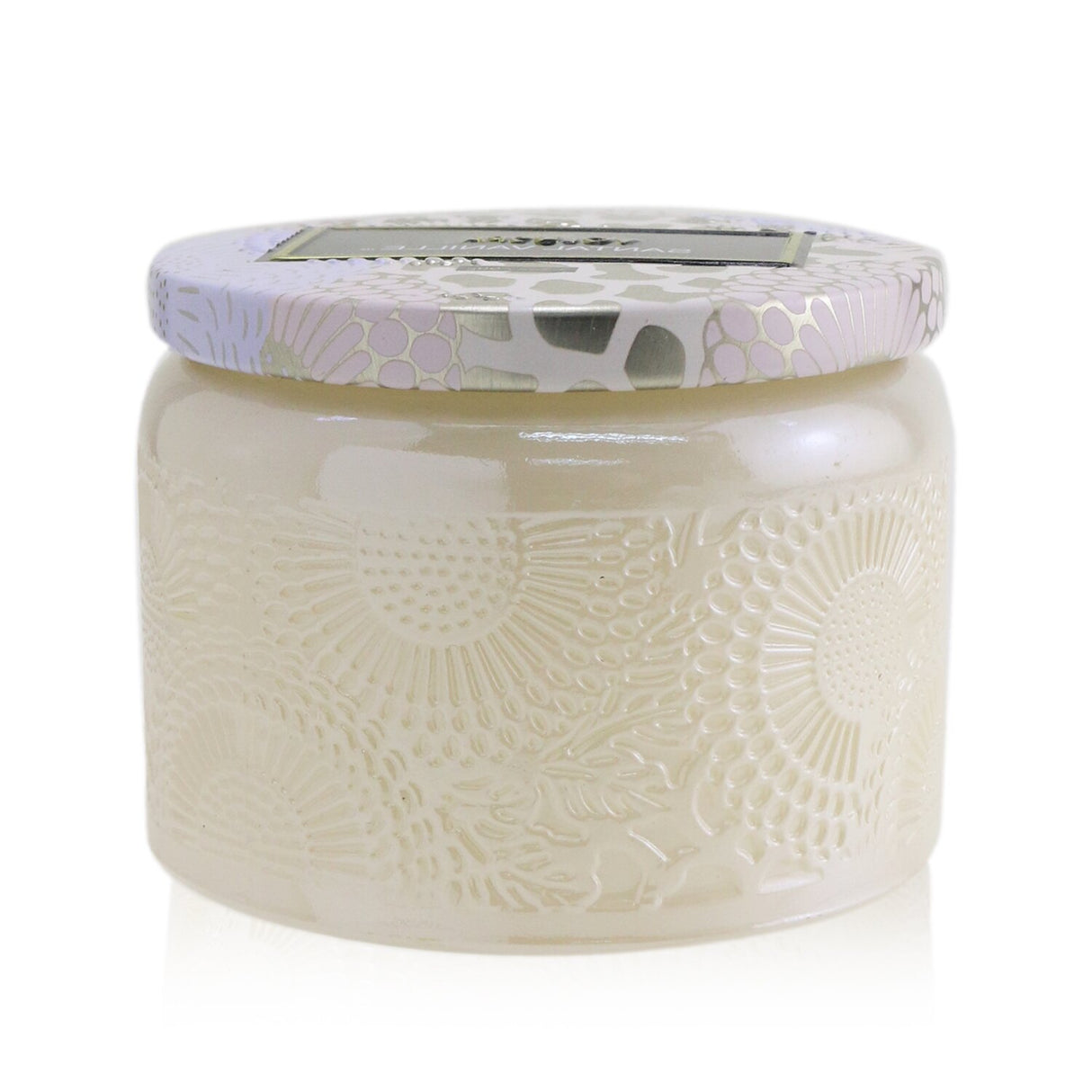 Voluspa Santal Vanille Petite Jar Candle, eco-friendly with a warm sandalwood and vanilla scent, in a decorative jar.