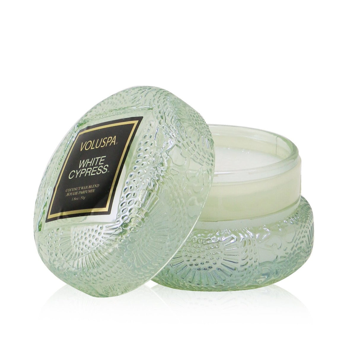 Luxurious Voluspa Macaron Candle in White Cypress, 51g, with geometric glass design and soothing fragrance.
