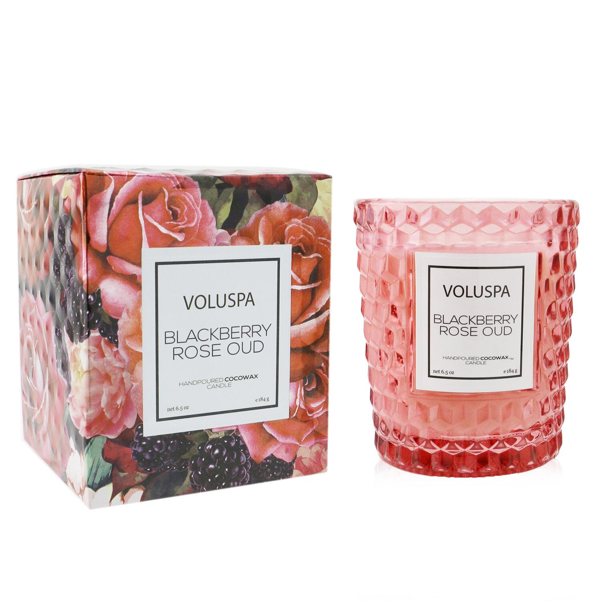 Voluspa Classic Candle in Blackberry Rose Oud, elegantly housed in a geometric glass container, offers a romantic floral aroma.