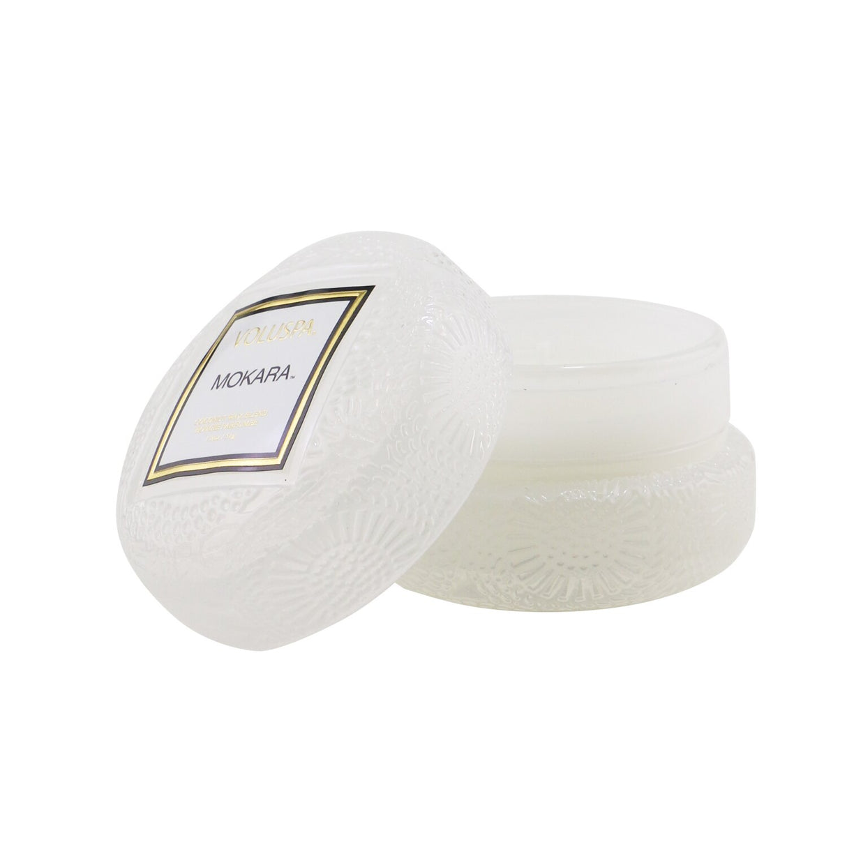 Voluspa Macaron Candle in Mokara with geometric glass container, coconut wax, and natural wicks for enchanting scent and décor.