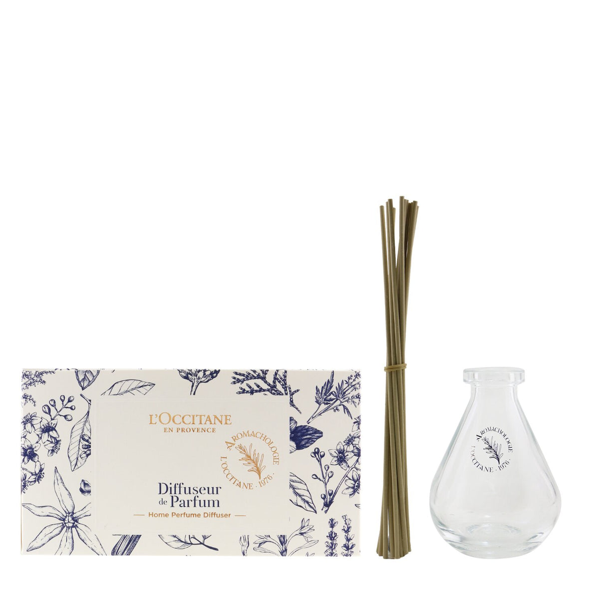 L'Occitane home perfume diffuser in droplet-shaped glass for elegant fragrance diffusion and Provence-inspired decor.