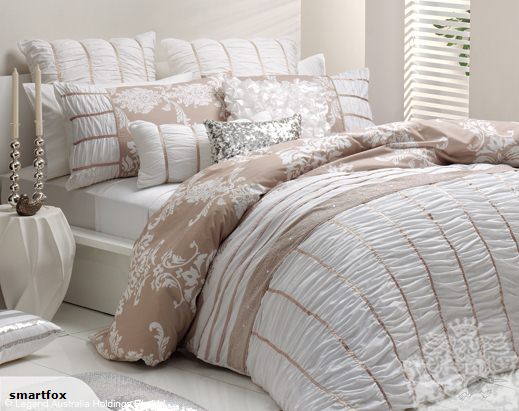 Stylish long linen cushion from Logan and Mason, perfect for adding elegance and comfort to any living space.