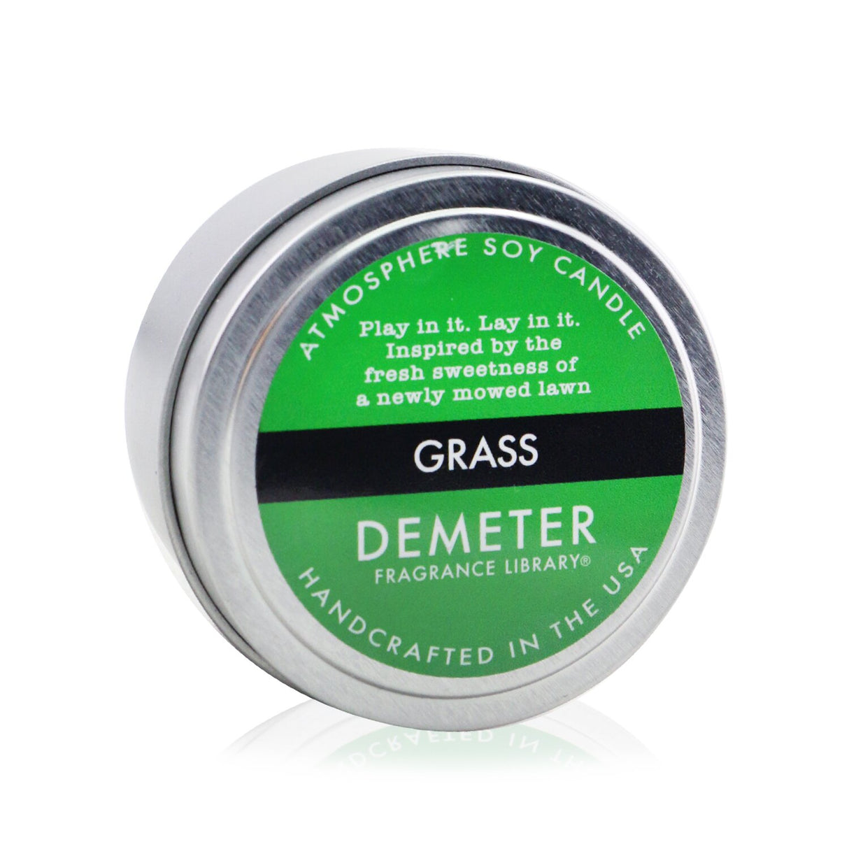 Handcrafted 170g soy candle with a fresh grass scent, creating a calming and inviting atmosphere in any room.