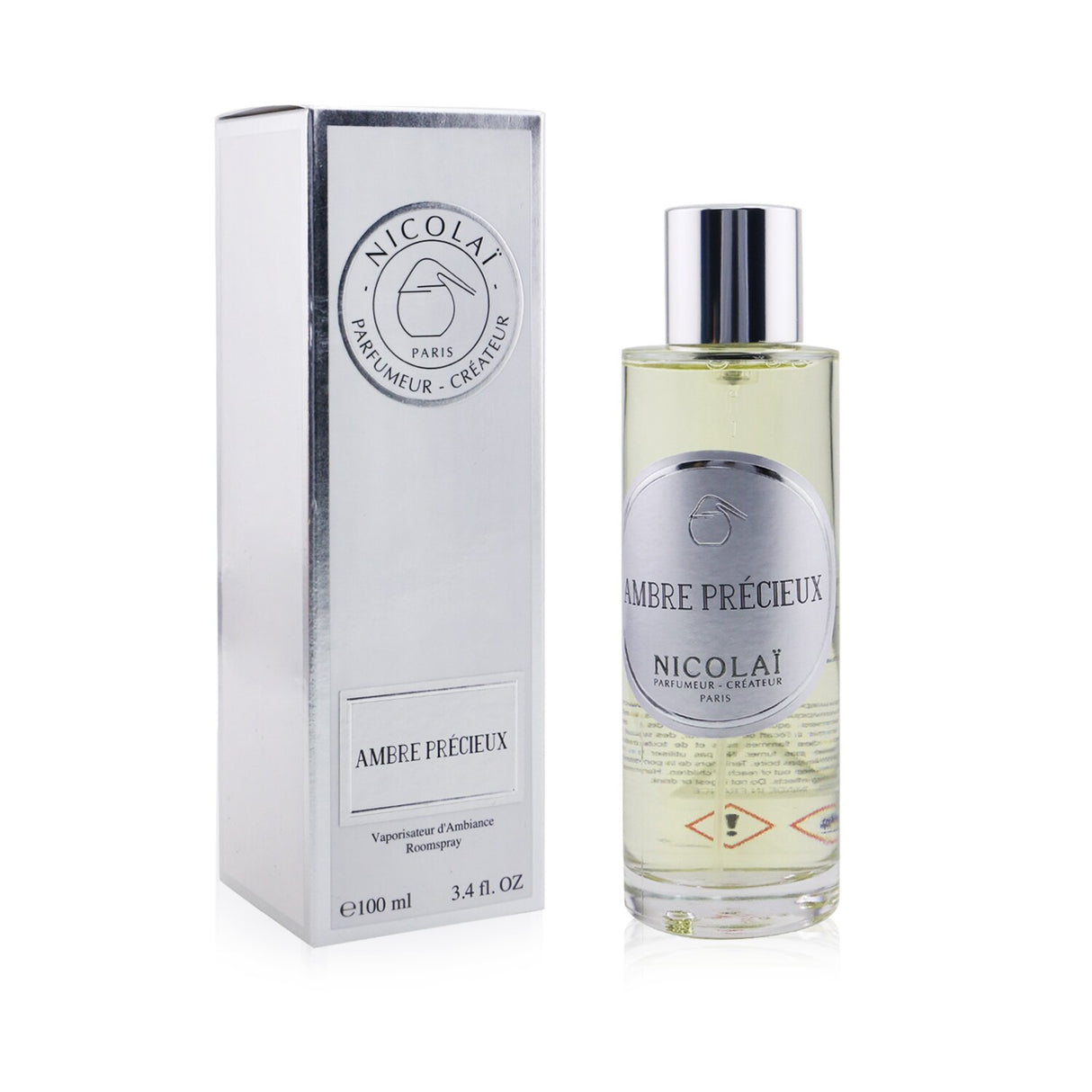 Luxury room spray Ambre Precieux by Nicolai, 100ml, adds warmth and elegance to your space with its sensuous fragrance.