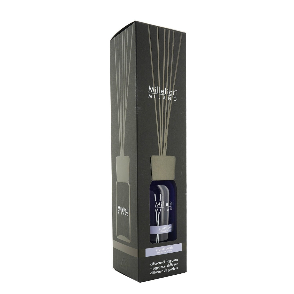 Millefiori Crystal Petals fragrance diffuser in elegant glass bottle, enhances home ambiance with natural scent and wooden sticks.