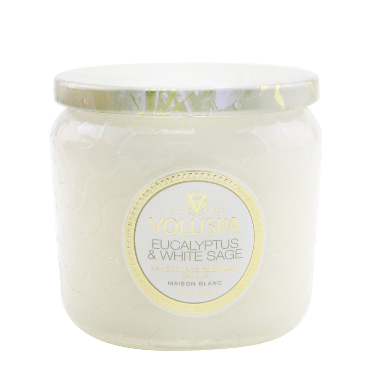 Petite Voluspa candle in Eucalyptus & White Sage, housed in a decorative glass jar with 35-hour burn time.