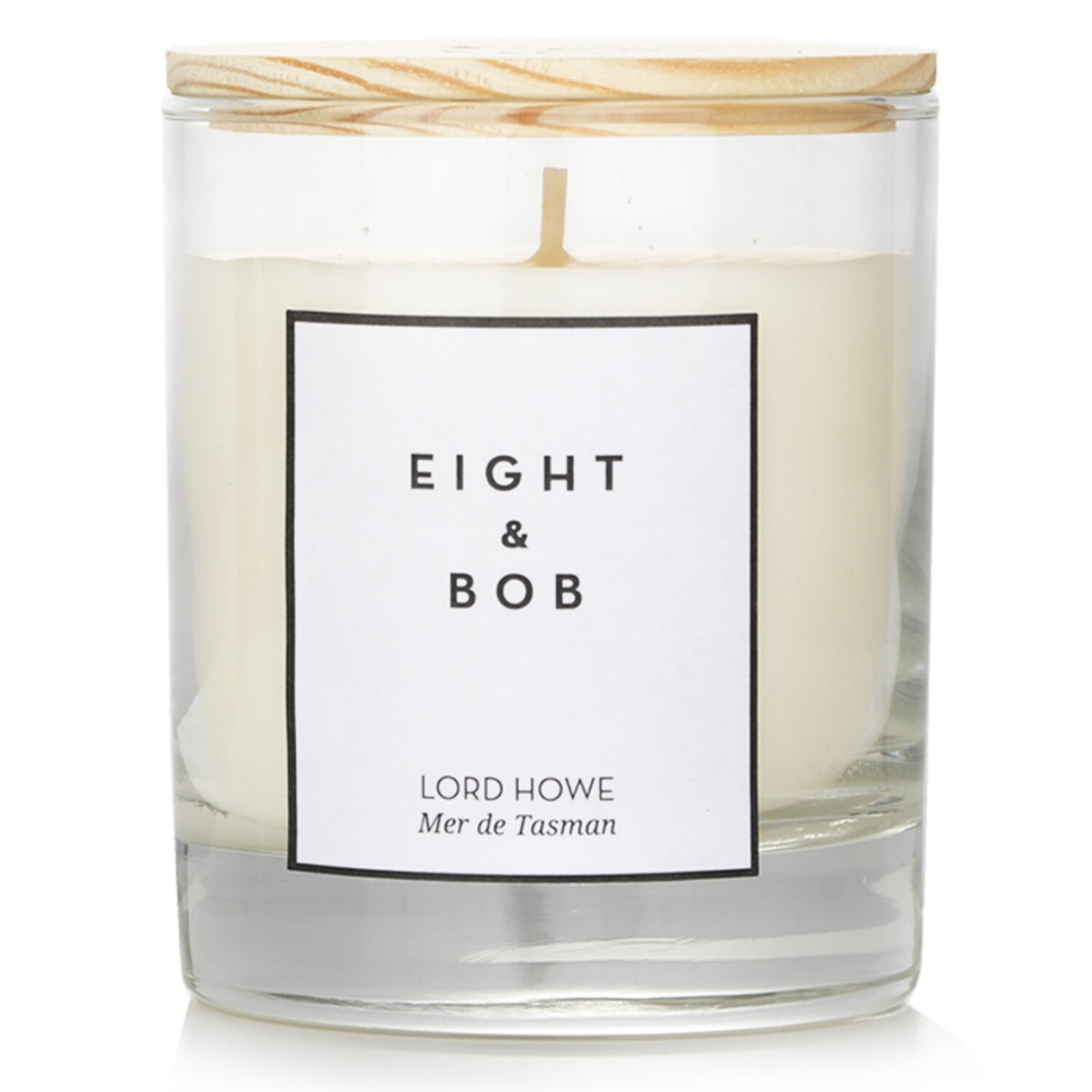 Luxurious Eight & Bob Lord Howe candle in monochrome packaging, 230g, featuring a fresh, serene scent and 60-hour burn time.
