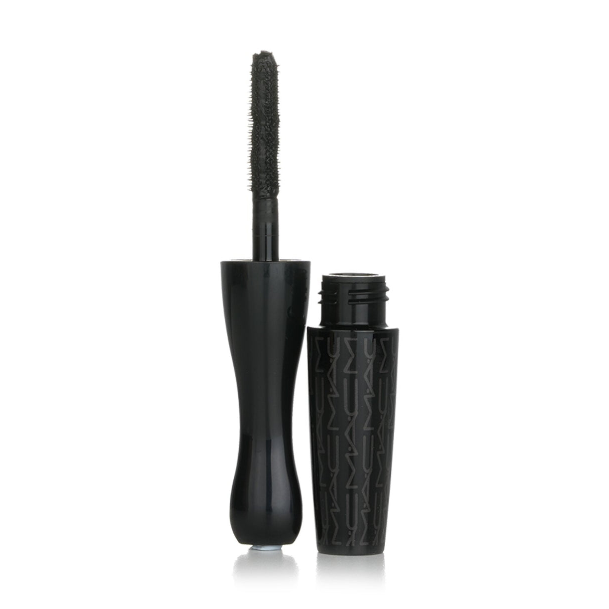 Mini MAC In Extreme Dimension Lash Mascara in #3D Black, delivering volume and curl with precision brush for captivating lashes.