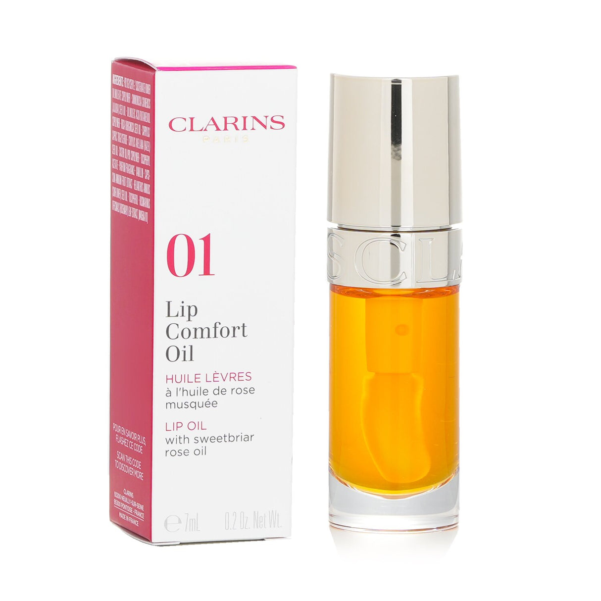 Clarins Lip Comfort Oil #01 Honey in a 7ml bottle, offering nourishing hydration and a radiant, dewy finish for lips.