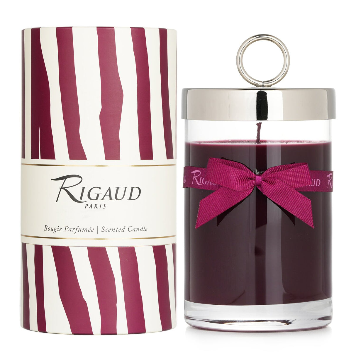 Elegant Rigaud scented candle in glass, infused with woody patchouli and teak, featuring a graceful bow tie for refined decor.