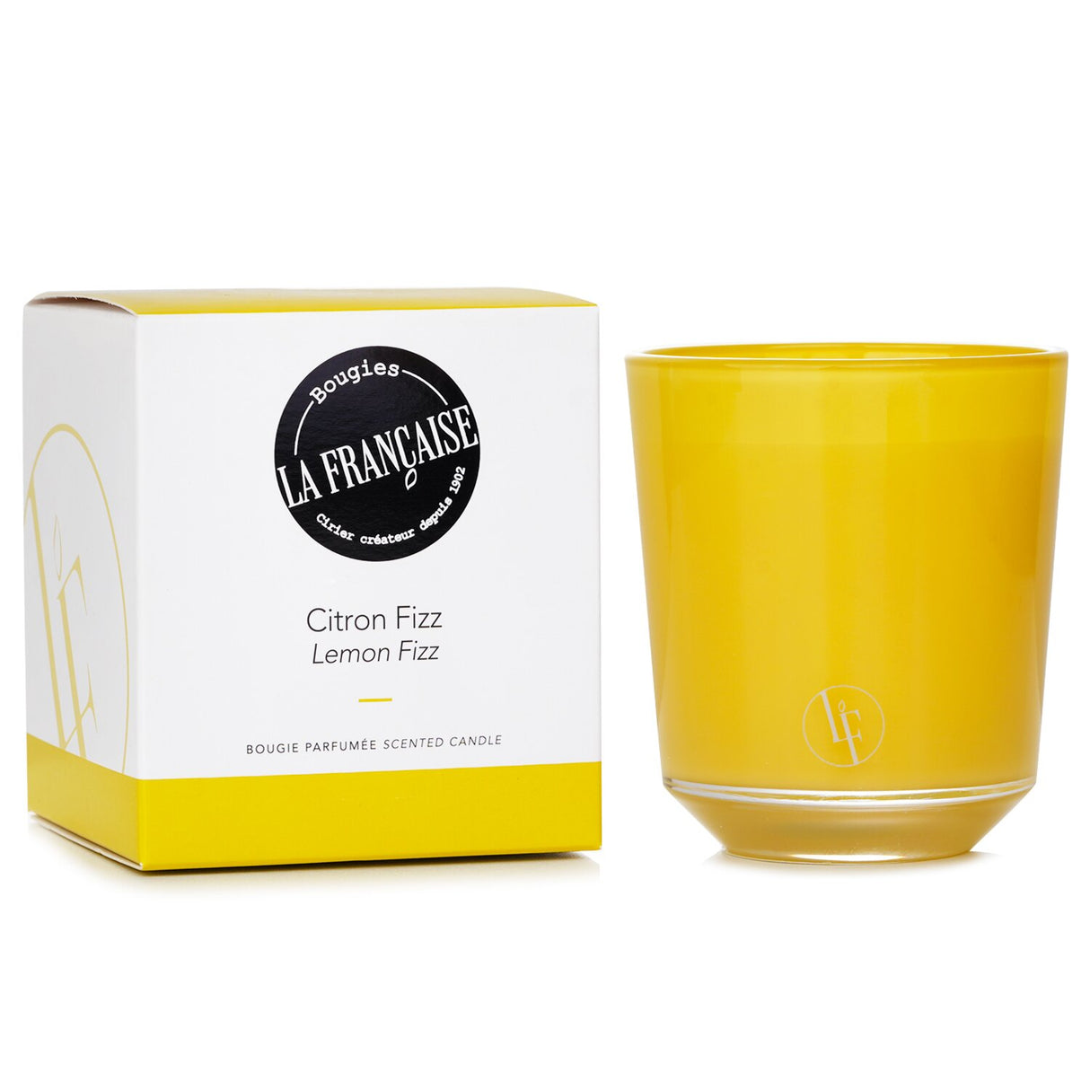 Refreshing Lemon Fizz Candle in vibrant yellow glass, with caviar lemon and mint scent; burns for 40 hours.