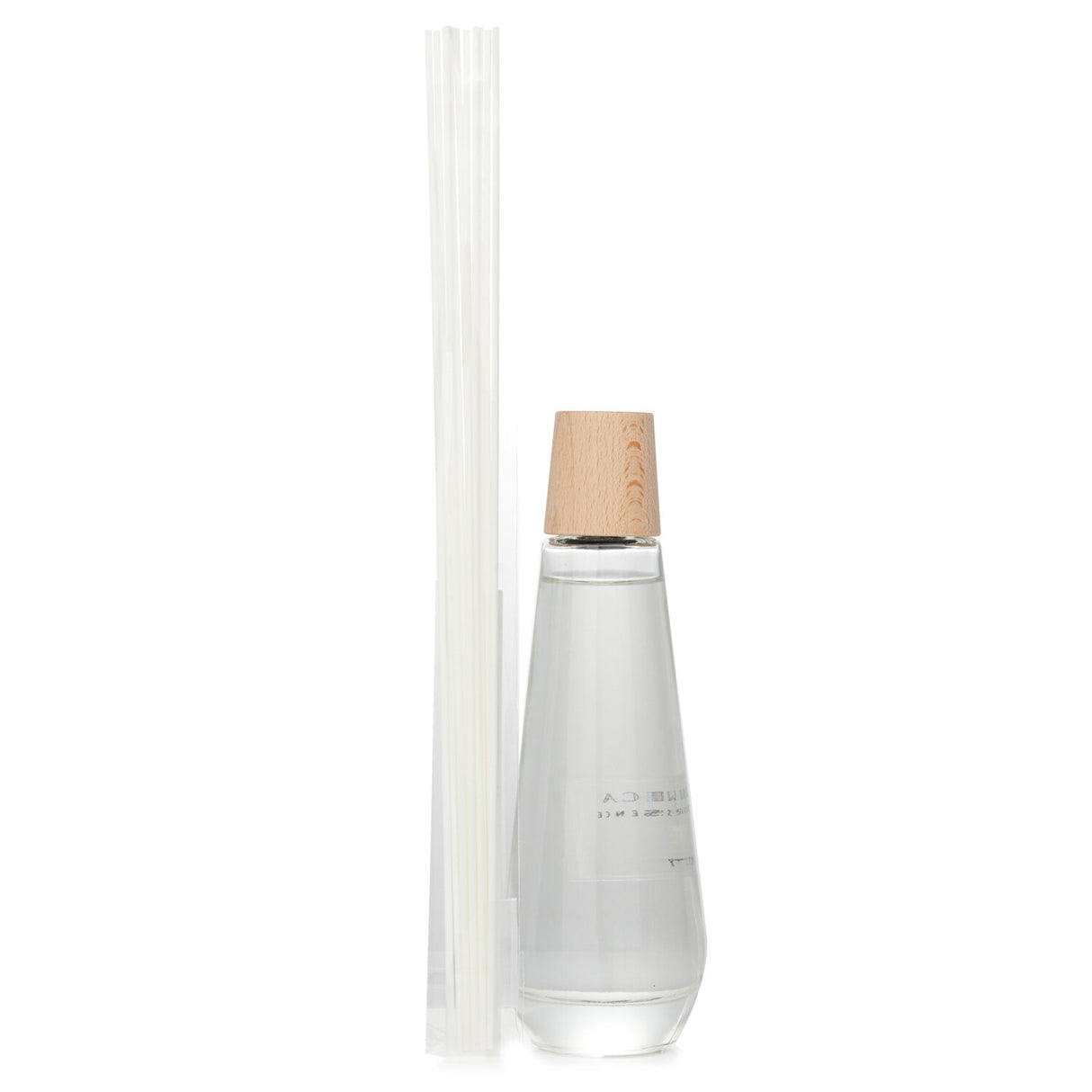 Stylish pyramid-shaped reed diffuser in floral scent, featuring Jasmine, Lily, and Musk for a serene home ambiance.