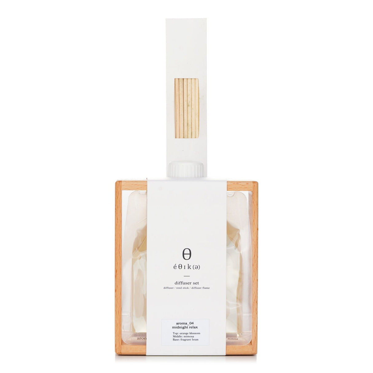 Elegant reed diffuser set with soothing aromas, wooden stand, and stylish design for home relaxation and decor.