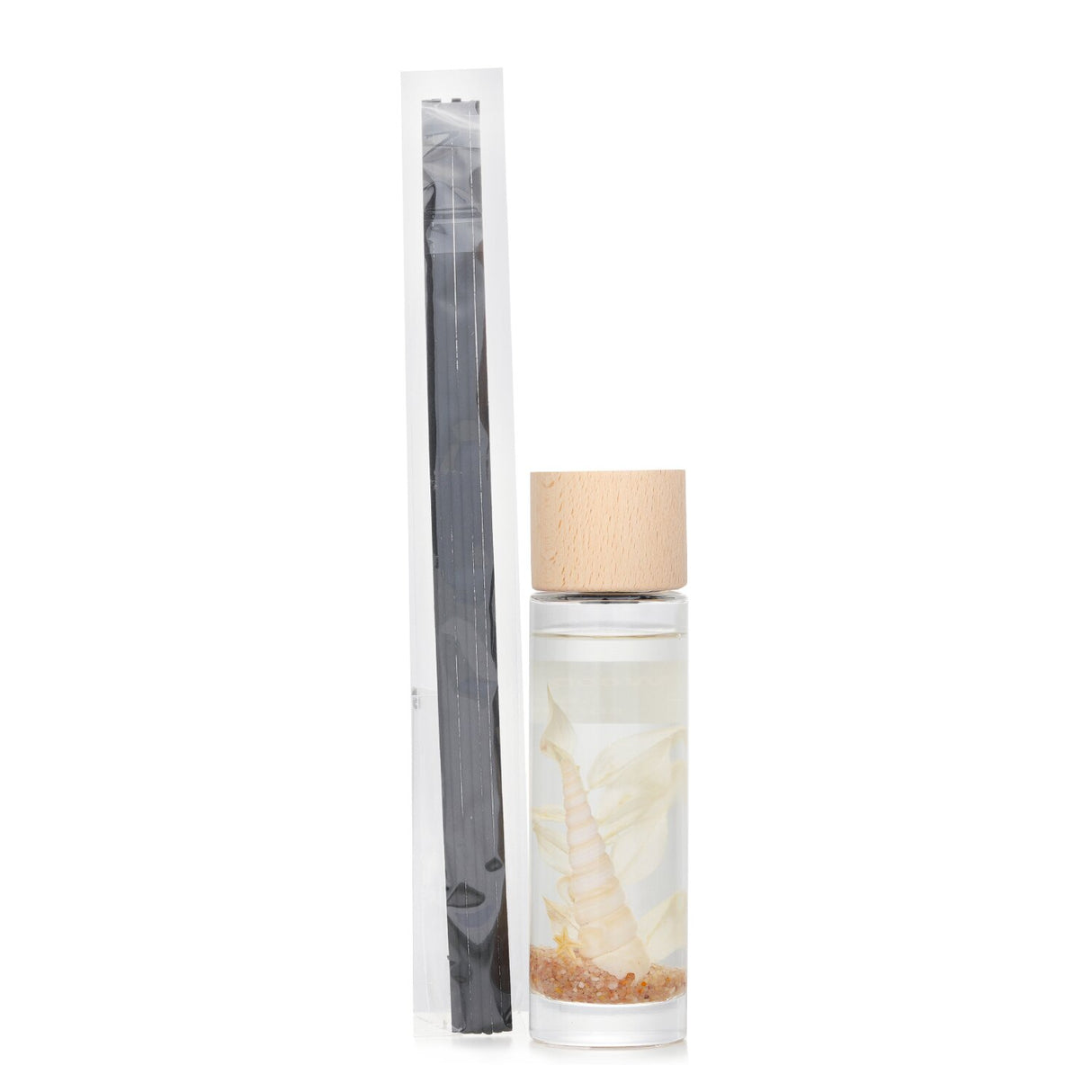 Botanica Sleep Ocean Reed Diffuser in a clear bottle with wooden lid, featuring calming floral and citrus scents for tranquility.