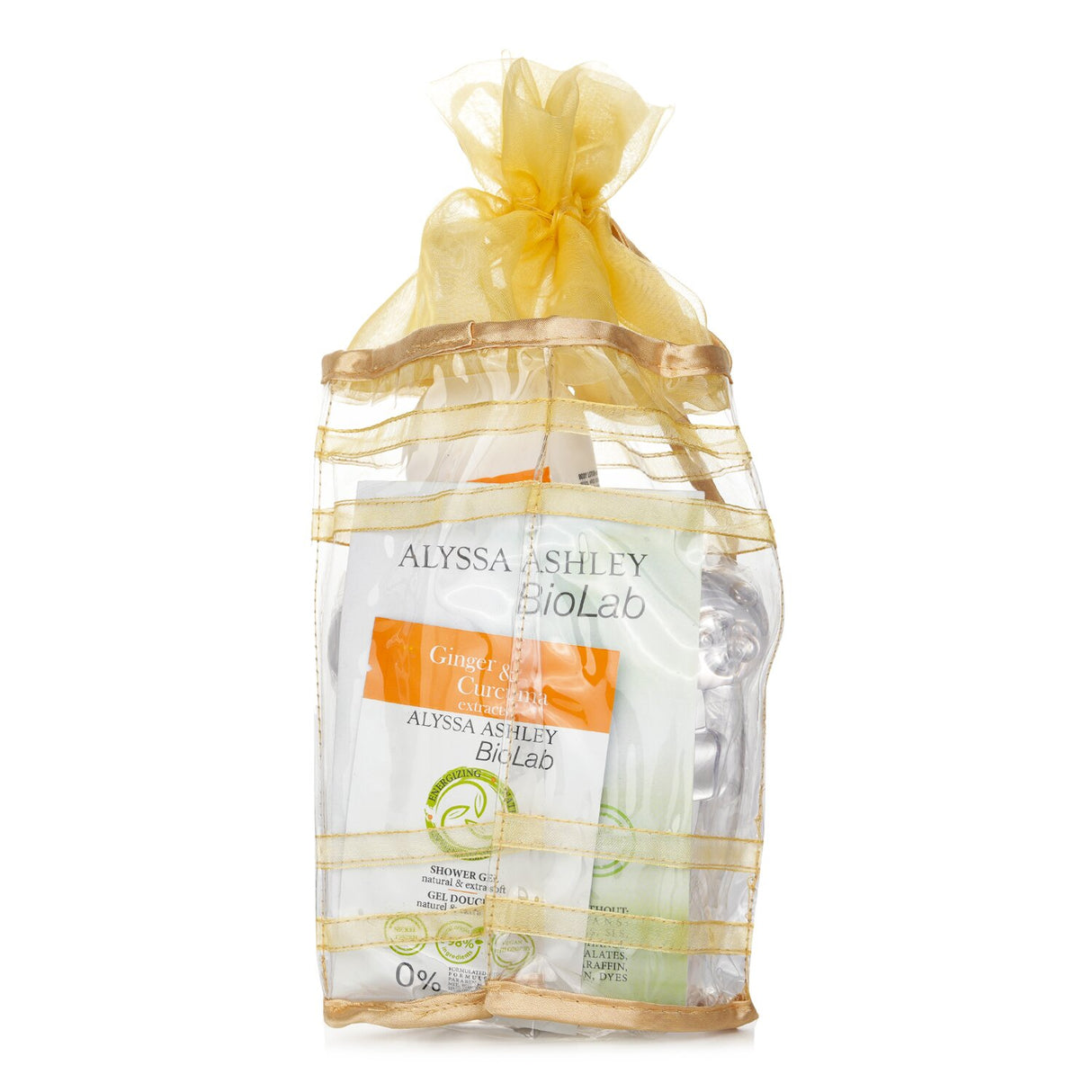 Alyssa Ashley Biolab set featuring ginger and curcuma body lotion, shower gel, and a dual-purpose massager for relaxation.