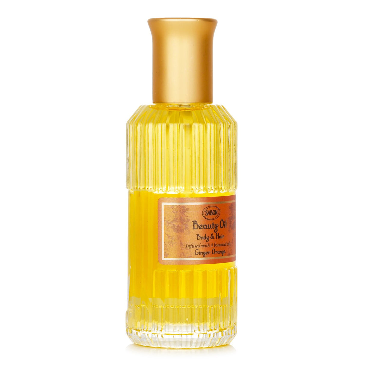 Luxurious vegan beauty oil with ginger orange scent, nourishing body and hair for a luminous, non-greasy finish.