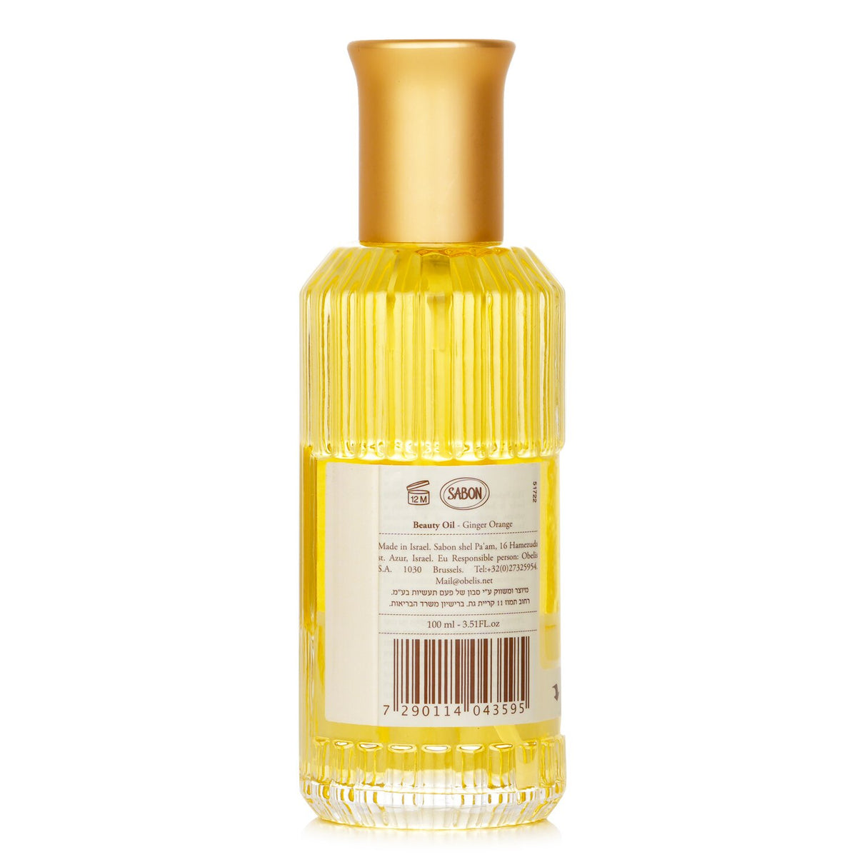 Vegan beauty oil in a 100ml bottle, infused with ginger orange fragrance, for nourishing body and hair without greasiness.
