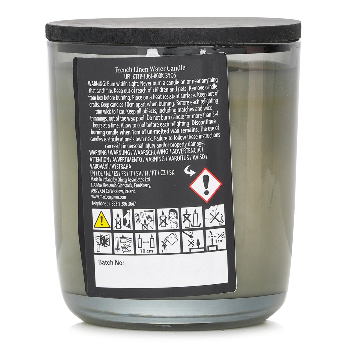 Natural wax candle in a glass jar, exuding a floral scent of lavender and citrus, perfect for creating a soothing atmosphere.