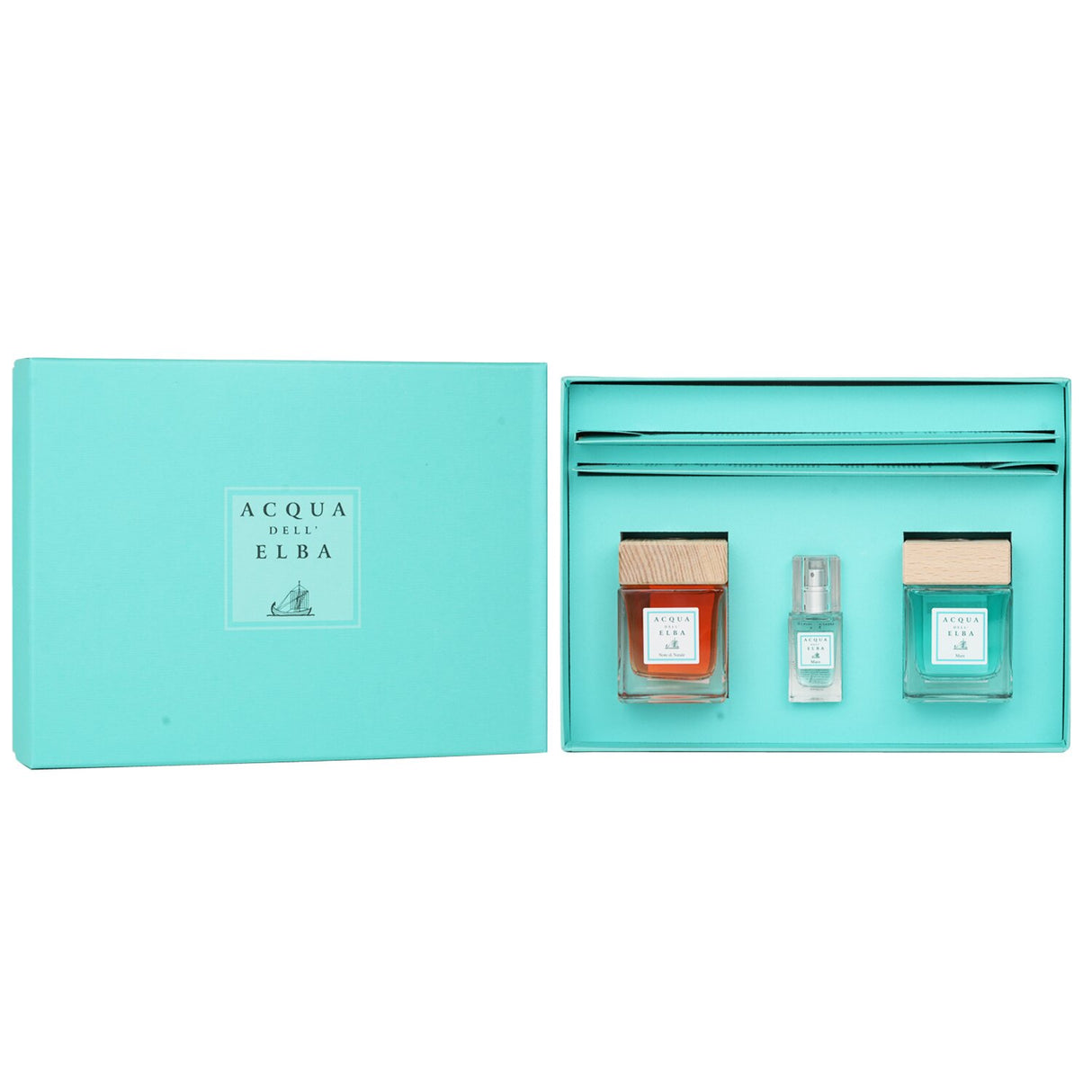 Elegant home scent coffret with two 100ml diffusers and a 15ml room spray, showcasing refined Italian craftsmanship.