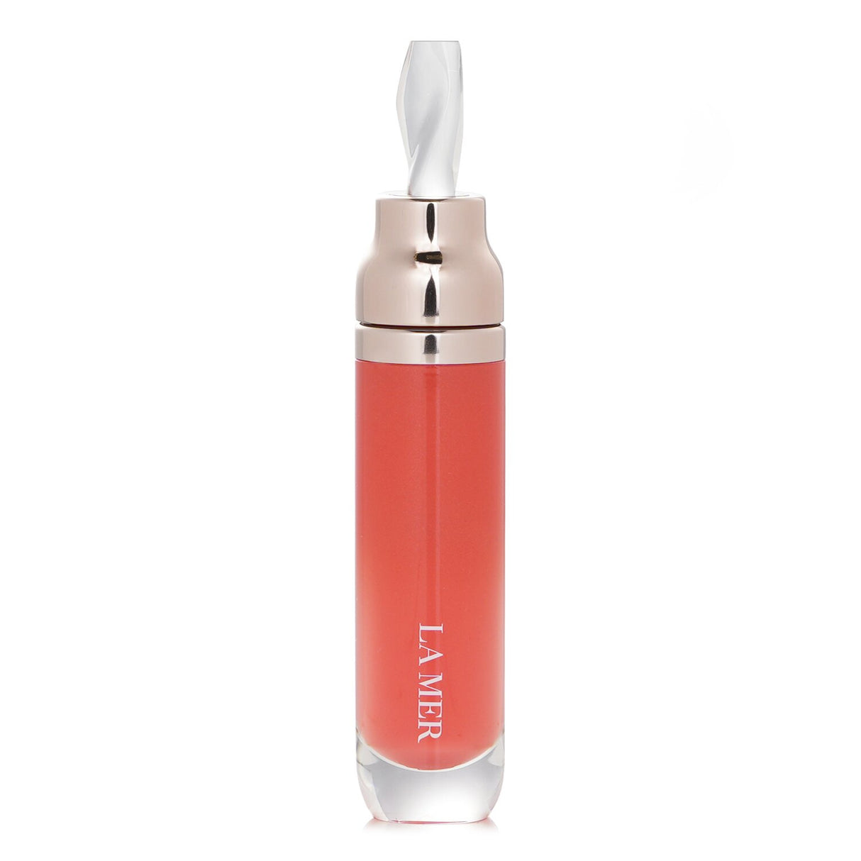La Mer Lip Volumizer #40 in Sheer Coral, a 7ml treatment for plump, hydrated, and nourished lips, enriched with antioxidants.