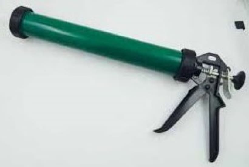 High-quality 600ml caulking gun with user-friendly trigger, ideal for precise adhesive application in home improvement projects.