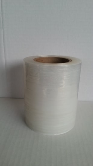 Clear hand stretch film bundle wrap, 23um thick, 100mm x 150m, 27 rolls per case; ideal for secure packaging and load retention.