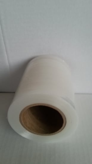 Clear SRS Bundle Wrap Hand Stretch Film, 23um thick, 100mm x 150m, 27 rolls per case, ideal for secure packaging.