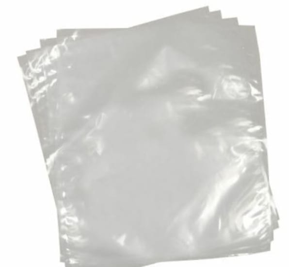 Heavy-duty clear plastic bags, 900x1200mm, pack of 50; ideal for storage, display, and transportation with excellent visibility.