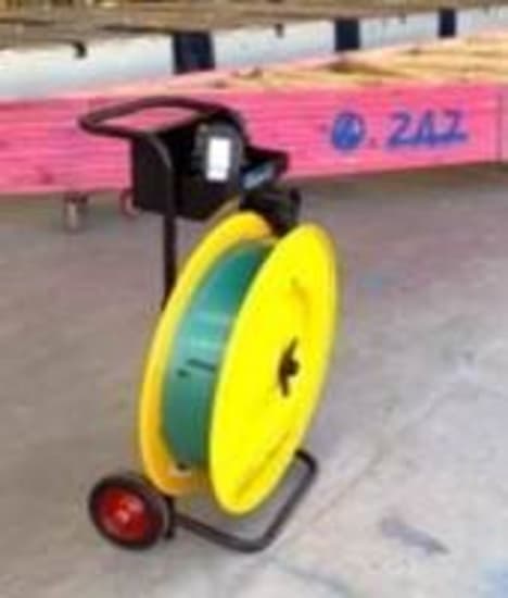 Robust PET Strapping Dispenser Stand with enlarged top tray for efficient strapping tool storage, ideal for warehouses and packaging.