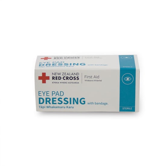 Sterile Red Cross Eye Pad Dressing packet with conforming bandage and adhesive for easy application and comfort.