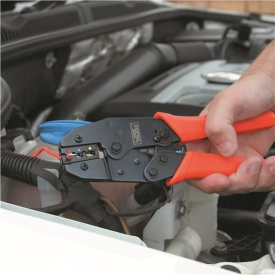 Toledo Ratcheting Crimping Pliers 220mm with ergonomic handles and colour-coded head for efficient electrical connections.