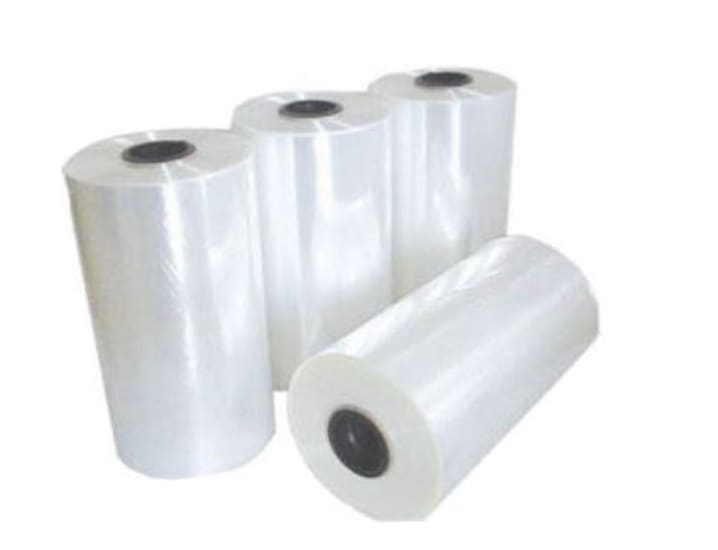 Natural LDPE shrink film roll, 320mm wide and 60mu thick, ideal for bundling and protecting products efficiently.