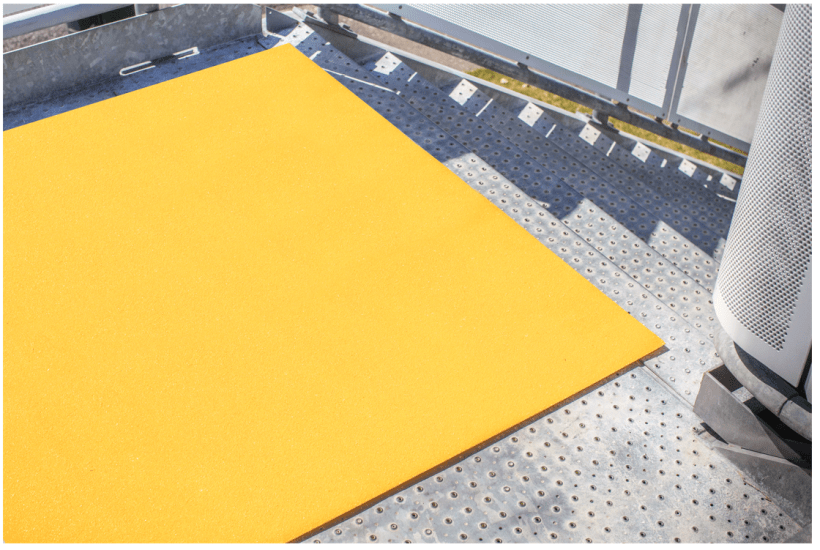 Fibreglass floor grit panel (1200 x 1200mm) with non-slip surface, bright yellow for visibility, ideal for safety in high-traffic areas.