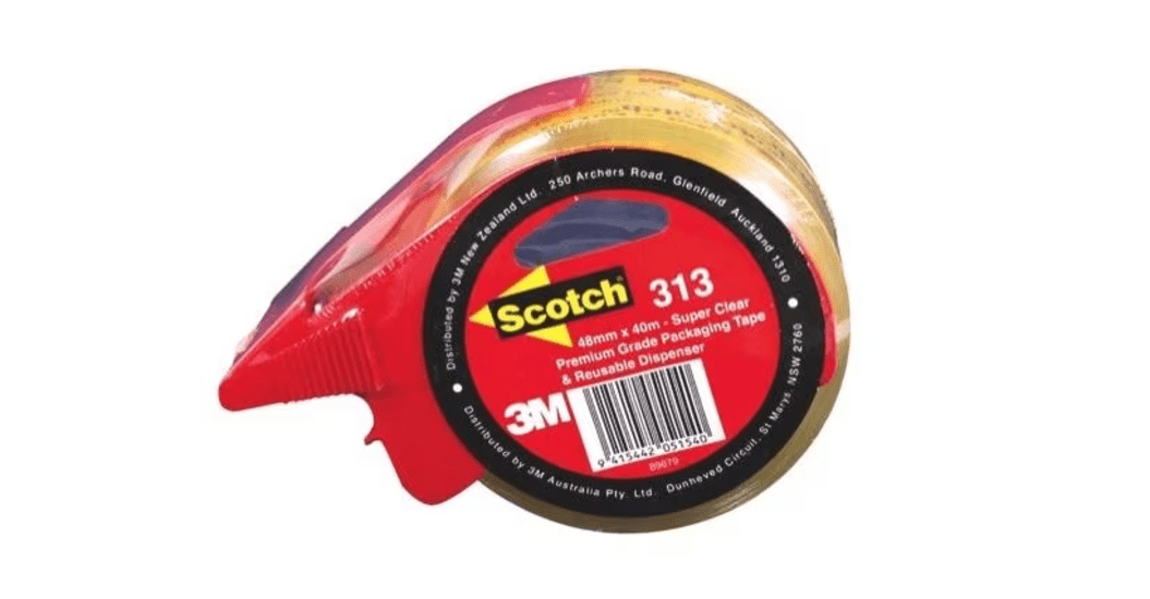 3M Scotch Sealing Tape 313 in a dispenser, durable, transparent, acrylic adhesive, ideal for packing and UV resistance.
