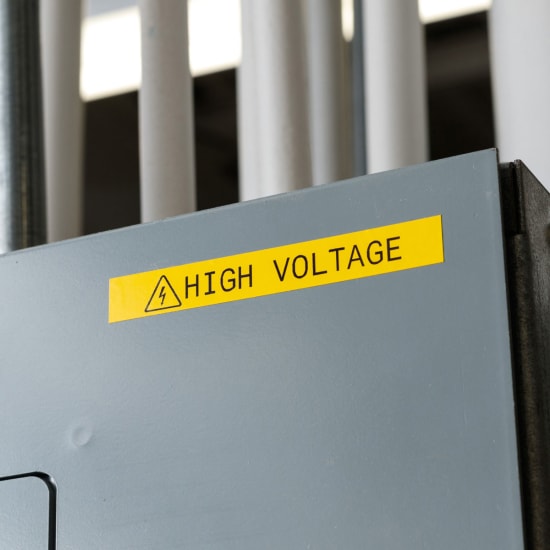 Durable yellow vinyl tape for M7 Printers, ideal for indoor/outdoor labeling with strong adhesive and high visibility.