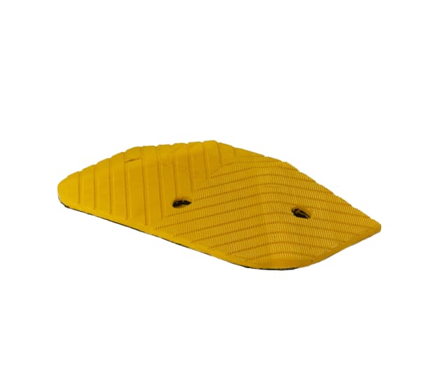 Heavy-duty rubber speed hump with yellow end cap for enhanced visibility and safety in traffic management.