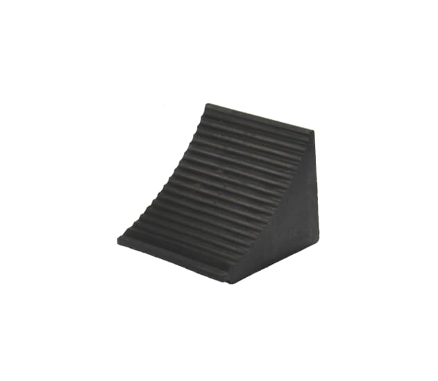 Large wheel chock made of durable thermoplastic rubber, featuring a ribbed slope and grab handle for secure vehicle stability.