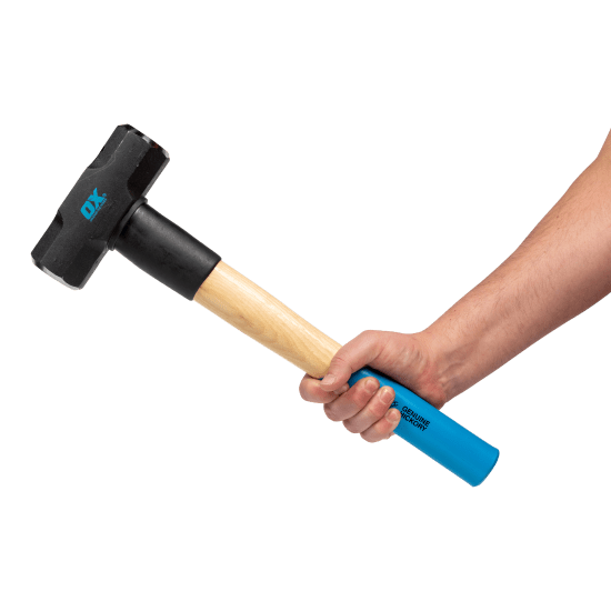 Durable OX Pro 6lb Mini Sledge Hammer with hickory handle and carbon steel head for precise striking and heavy-duty tasks.