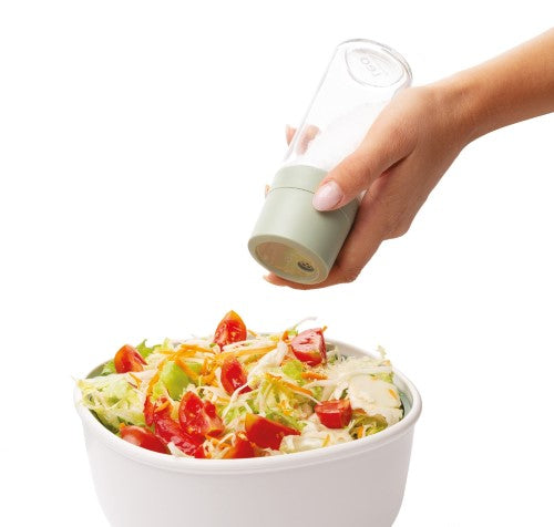 2-pc grinder and shaker set made from recycled plastics, featuring adjustable grinding and a rotating lid for easy seasoning control.