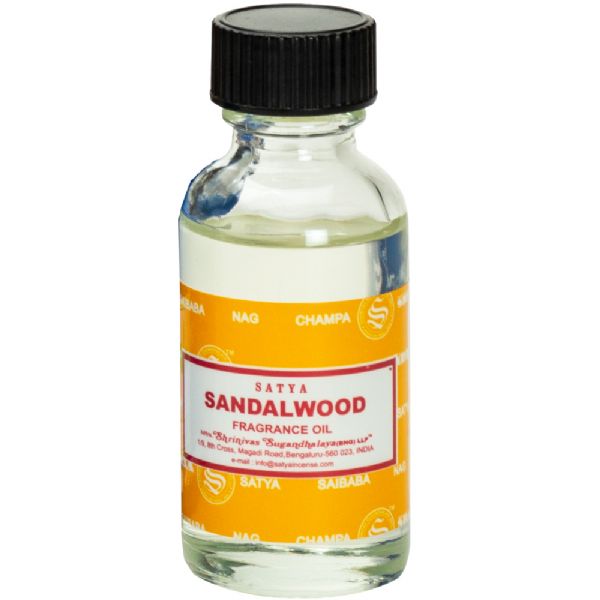 Sandalwood fragrance oil in a 30ml bottle for use in oil burners or diffusers, creating an exotic atmosphere.
